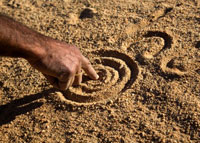 Drawing symbols in the sand